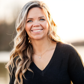 a headshot photo of a lady